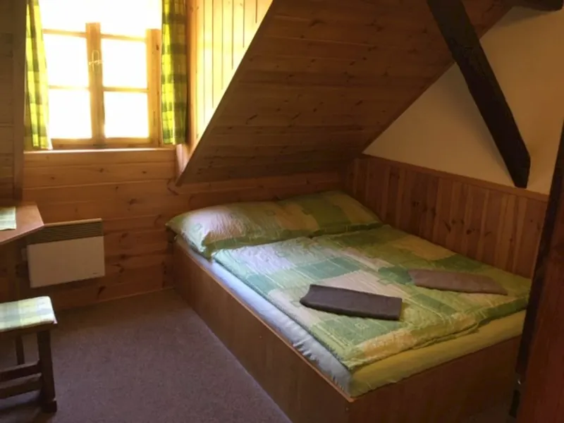 Dvoulůžkový pokoj s manželskou postelí